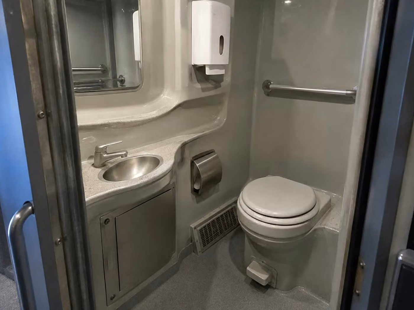 tucker 56 passenger charter bus onboard restroom