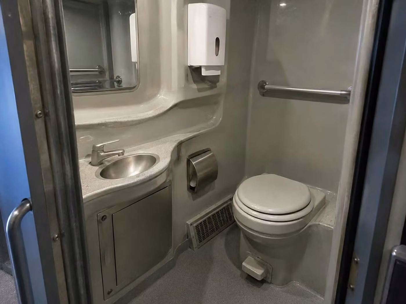tucker charter bus onboard restroom
